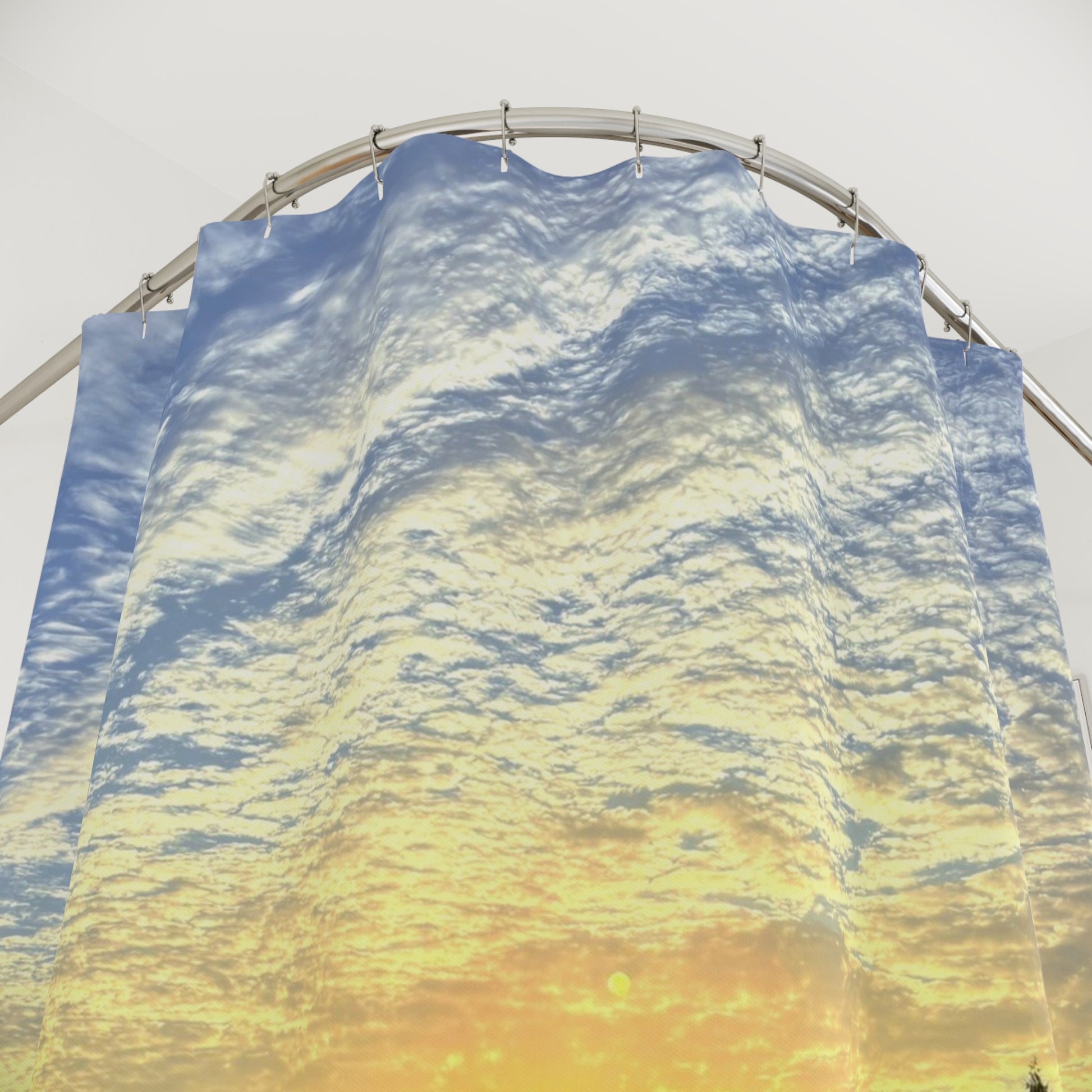 Shower curtain with textured sky and golden clouds from a sunset scene. Bringing warmth and calm to your space.