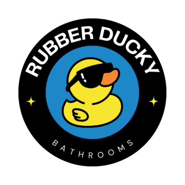 Rubber Ducky Bathrooms logo featuring a cool duck with sunglasses on a blue circle.