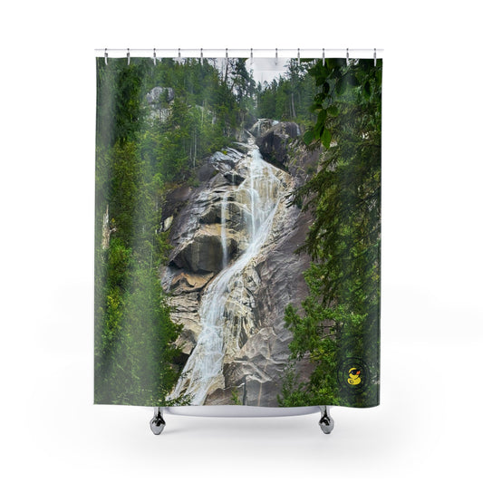 Shower curtain featuring a scenic waterfall flowing down rocky cliffs surrounded by dense green forest.